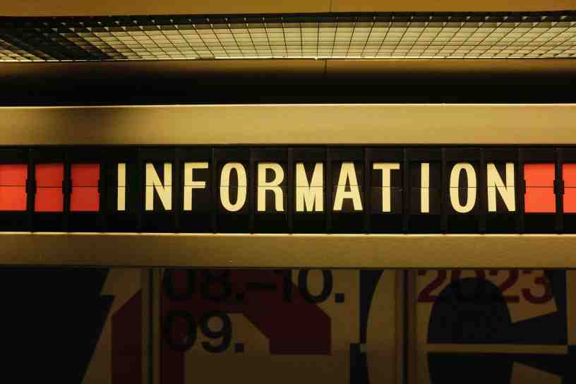 A kind of marque outside of a space with the word "Information" appearing in the lettering.
